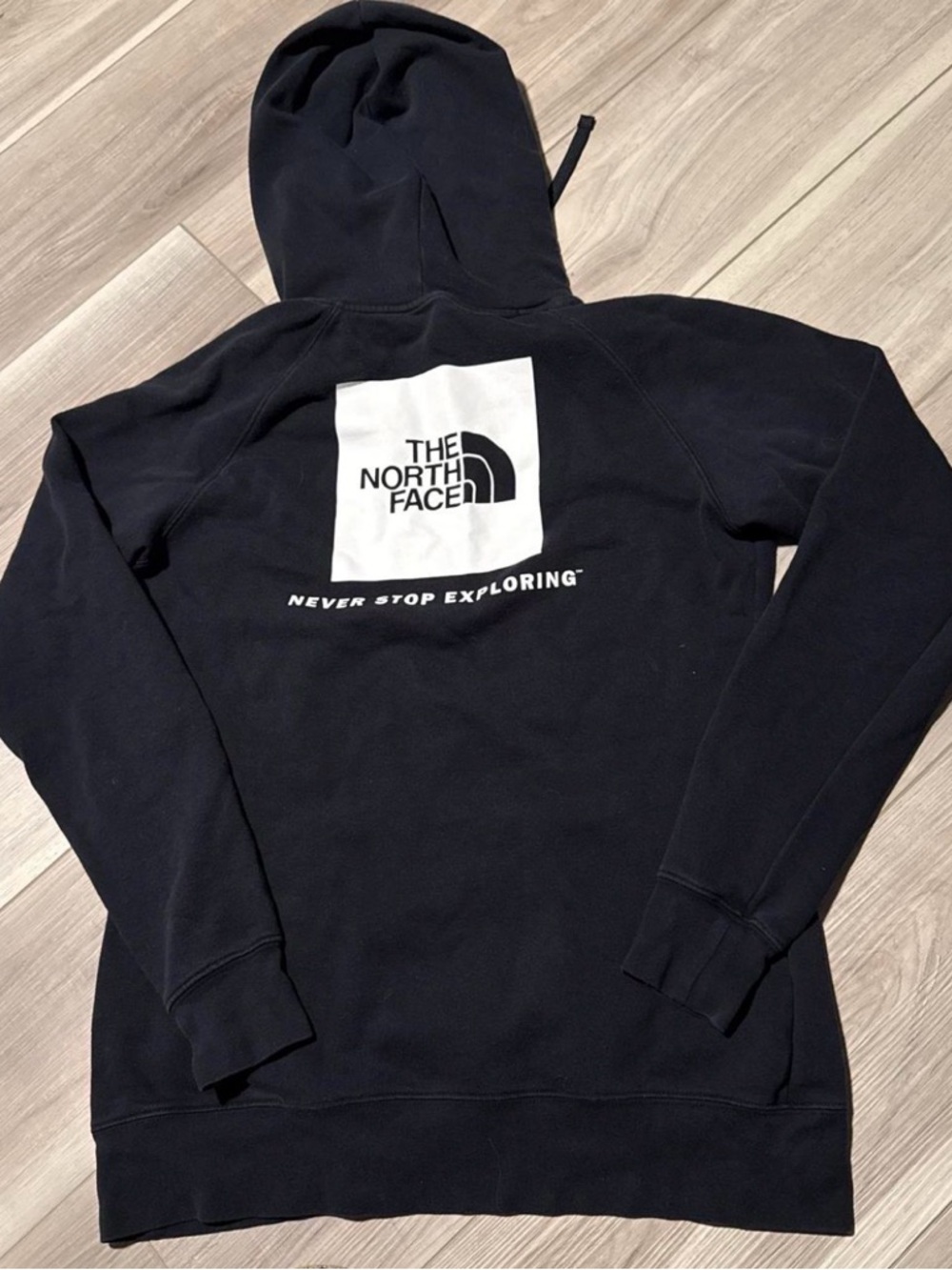 The North Face Black Pullover Hoodie with White Logo Tag